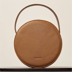 Reformation x Mint & Rose Anne Circle Bag in Cognac
